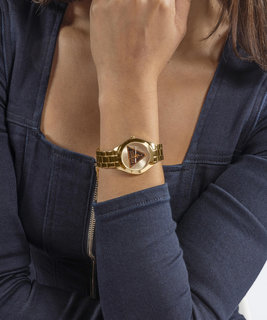 Zlatá barva, Tri Plaque hodinky