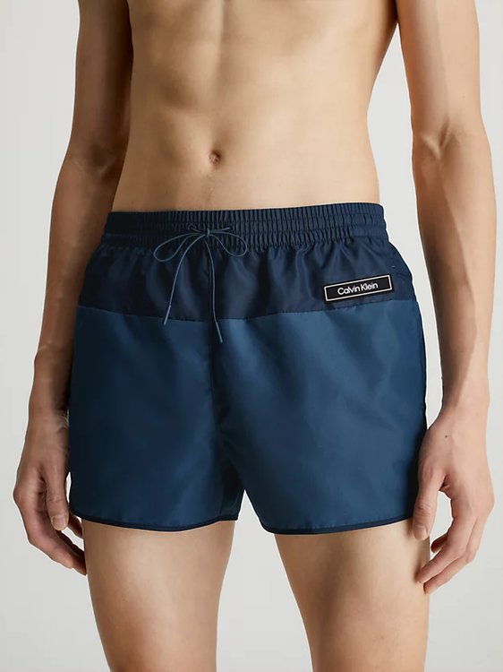 Core Solids plavky – Calvin Klein Swimwear, Modrá barva Muži
