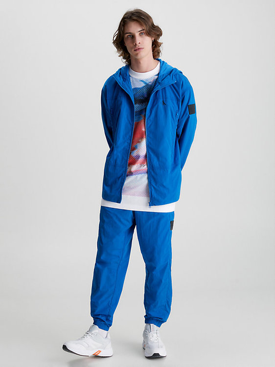 Módní Badge Crinkle větrovka, Modrá barva, 2023