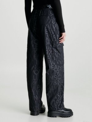 Loose Logo kalhoty – Calvin Klein Jeans, Černá barva Ženy