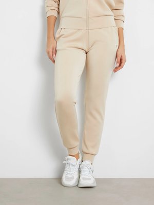 GUESS – Olympe Long tepláky, Béžová barva