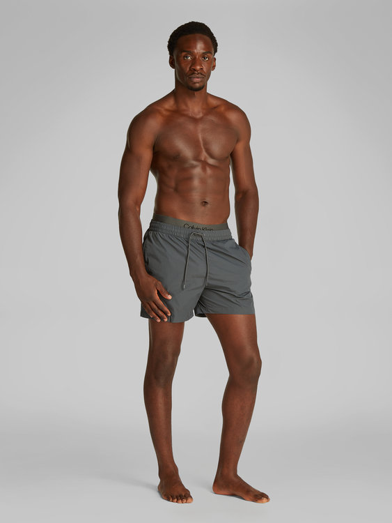 Calvin Klein Swimwear – KM0KM01104-PBL plavky MEDIUM DOUBLE WB