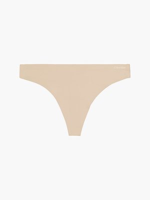 Calvin Klein Underwear – Tanga Invisibles, Krémová barva