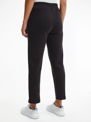 není fotka Institutional tepláky