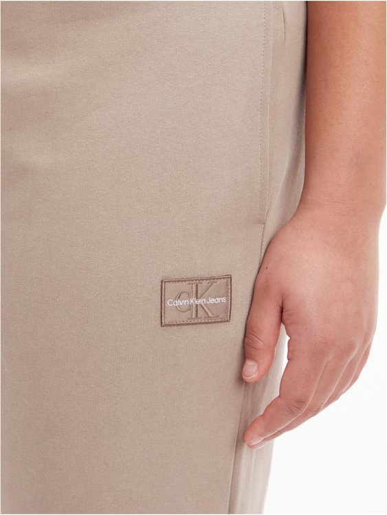 Módní J20J219737-A03 tepláky, 2022